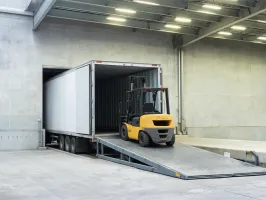 Manufacturing plant dock with forklift crossing